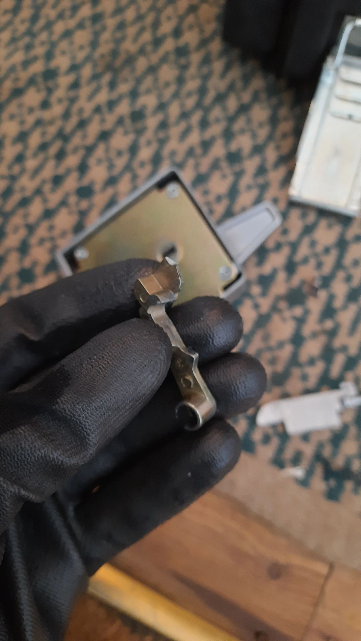 Failed high-security nightlatch removed from a front door in Staines